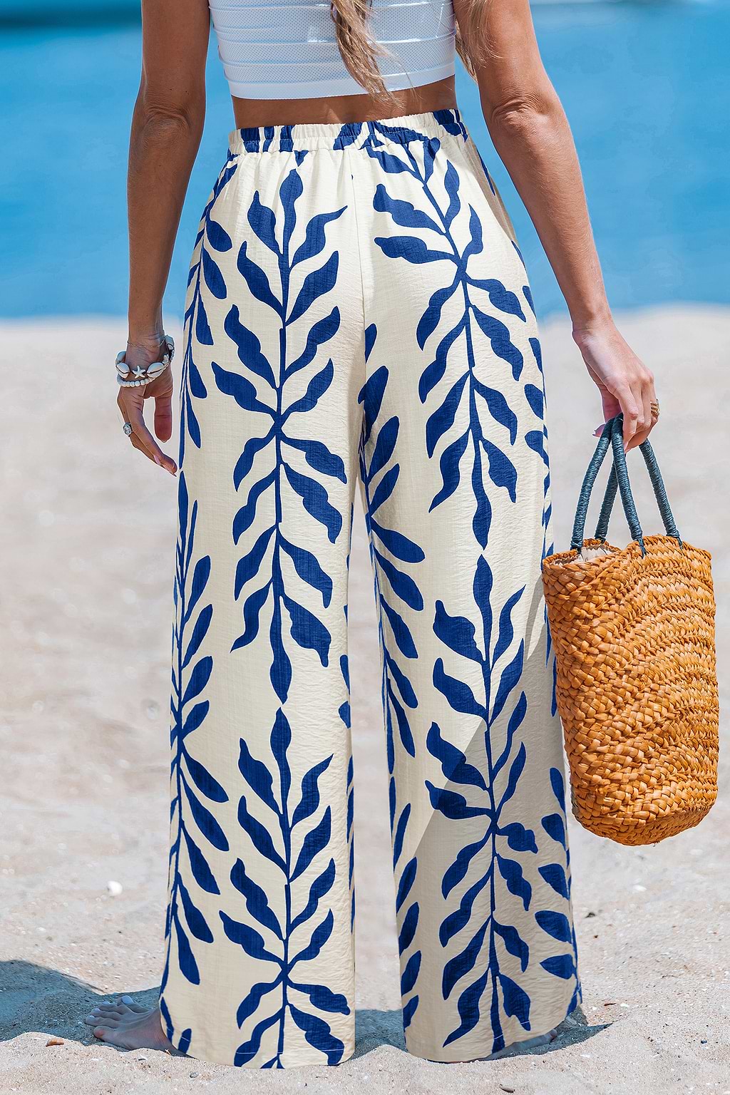Pantalon tropical imprimé lune au style fluide