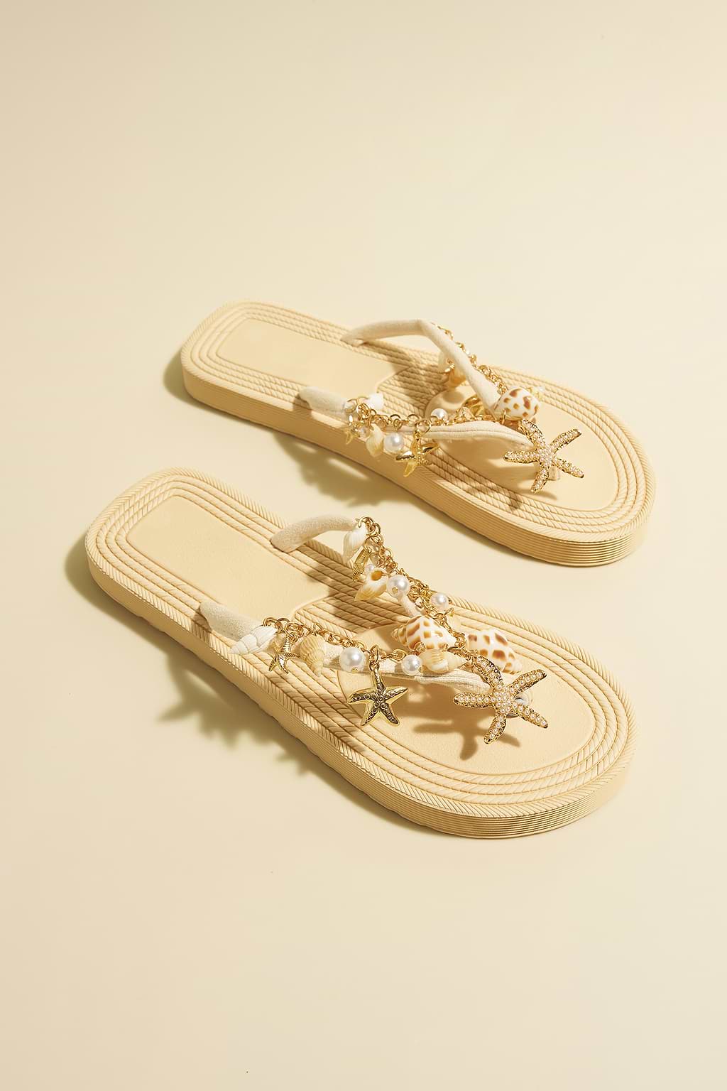 Cremefarbene Flip-Flops