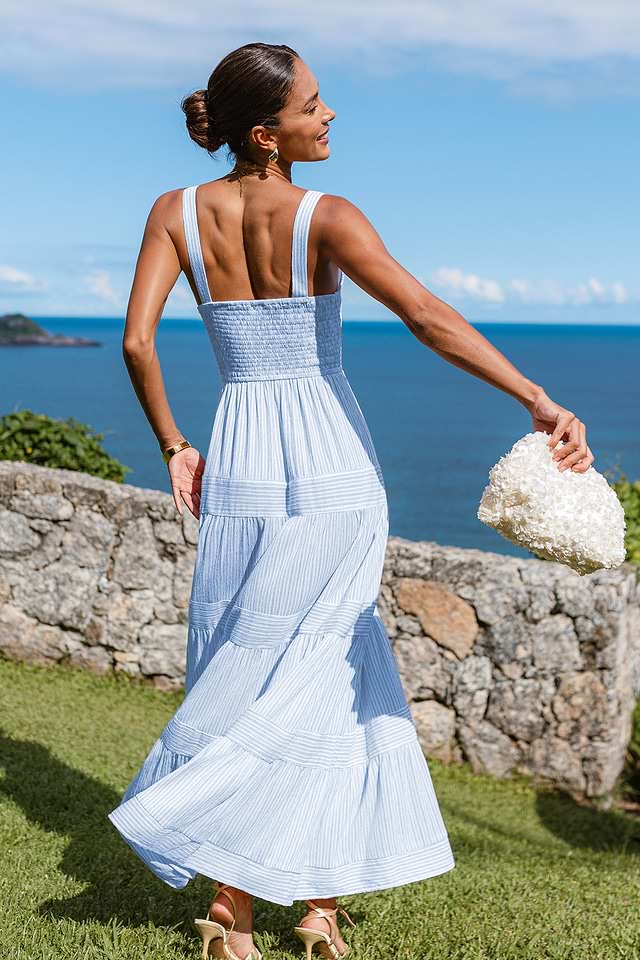 blue white striped maxi dress Jolee while the knit fabric provides comfort and style Ivie Halter Plunge Maxi Dress