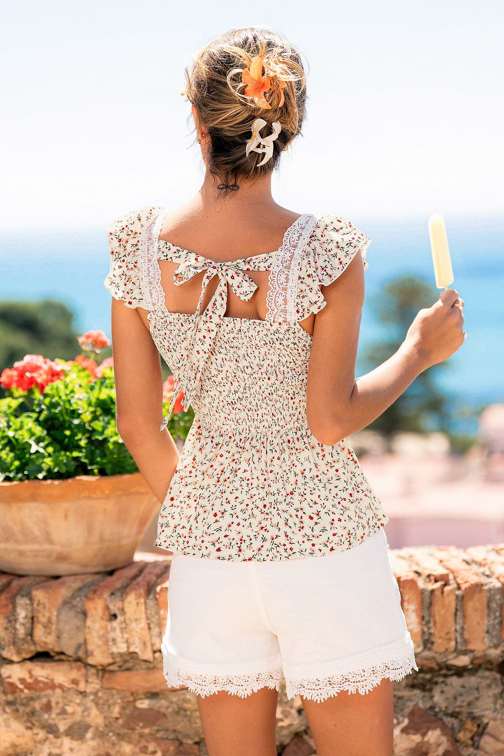 Top floreale unico