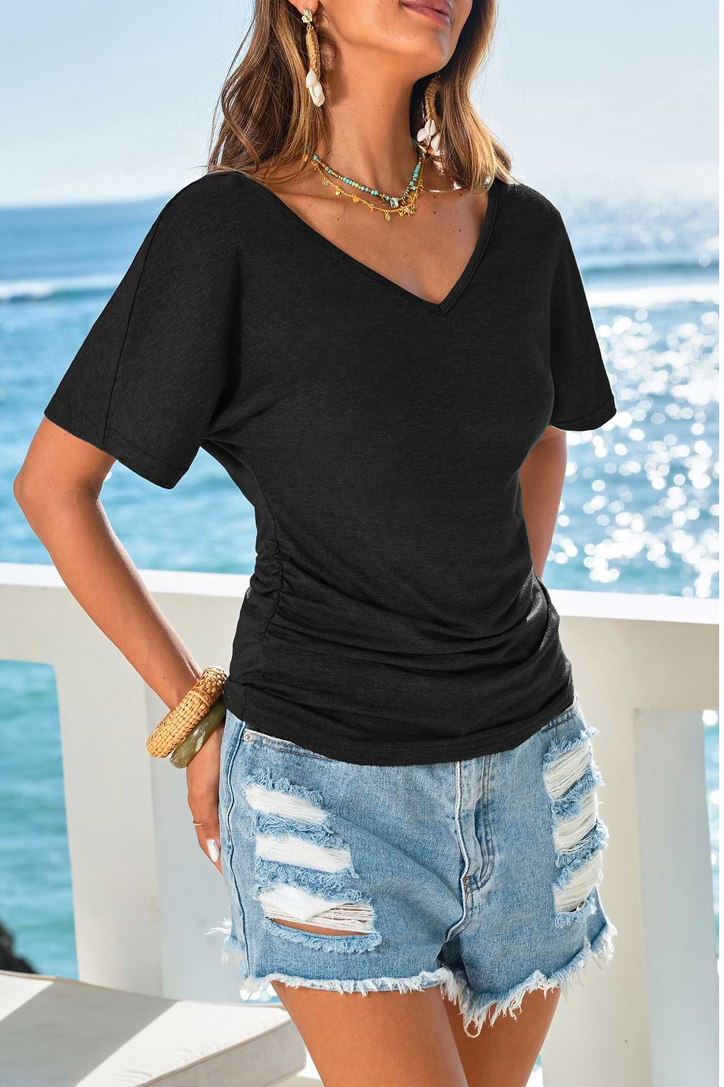 Top noir en tricot à taille cintrée