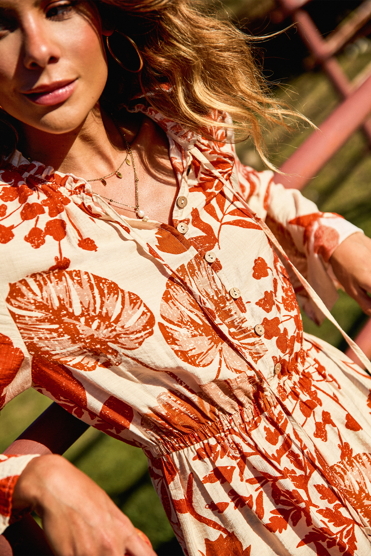 Tropical Print Long Sleeve Romper with Notched Neckline