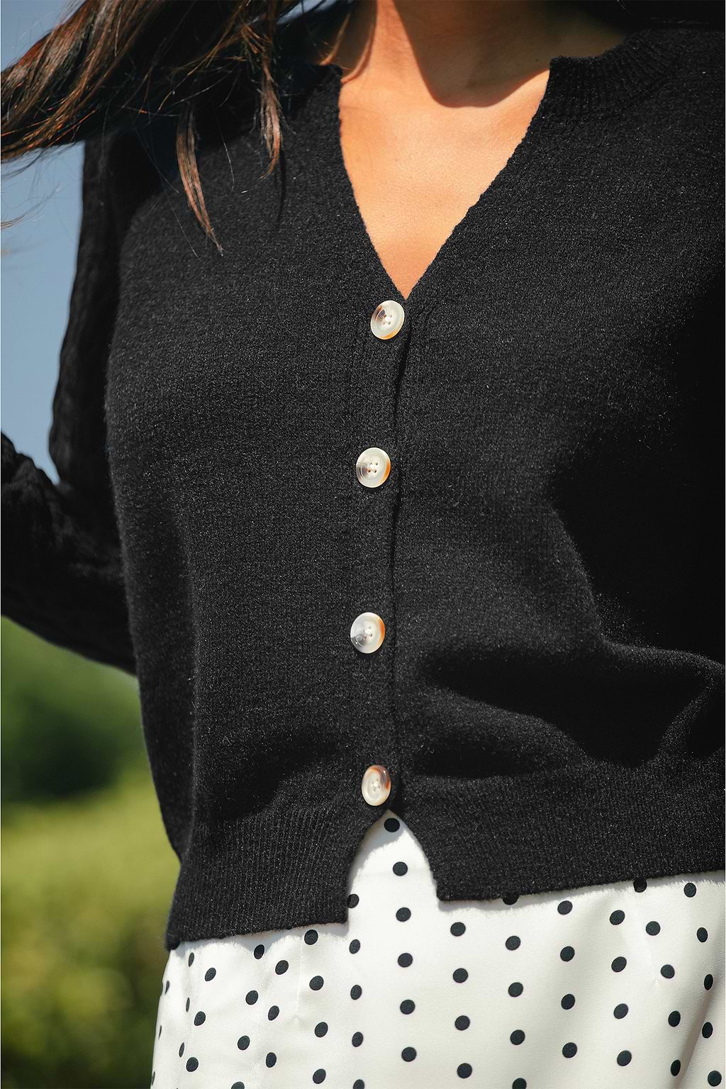 Cardigan noir à col cranté et manches longues