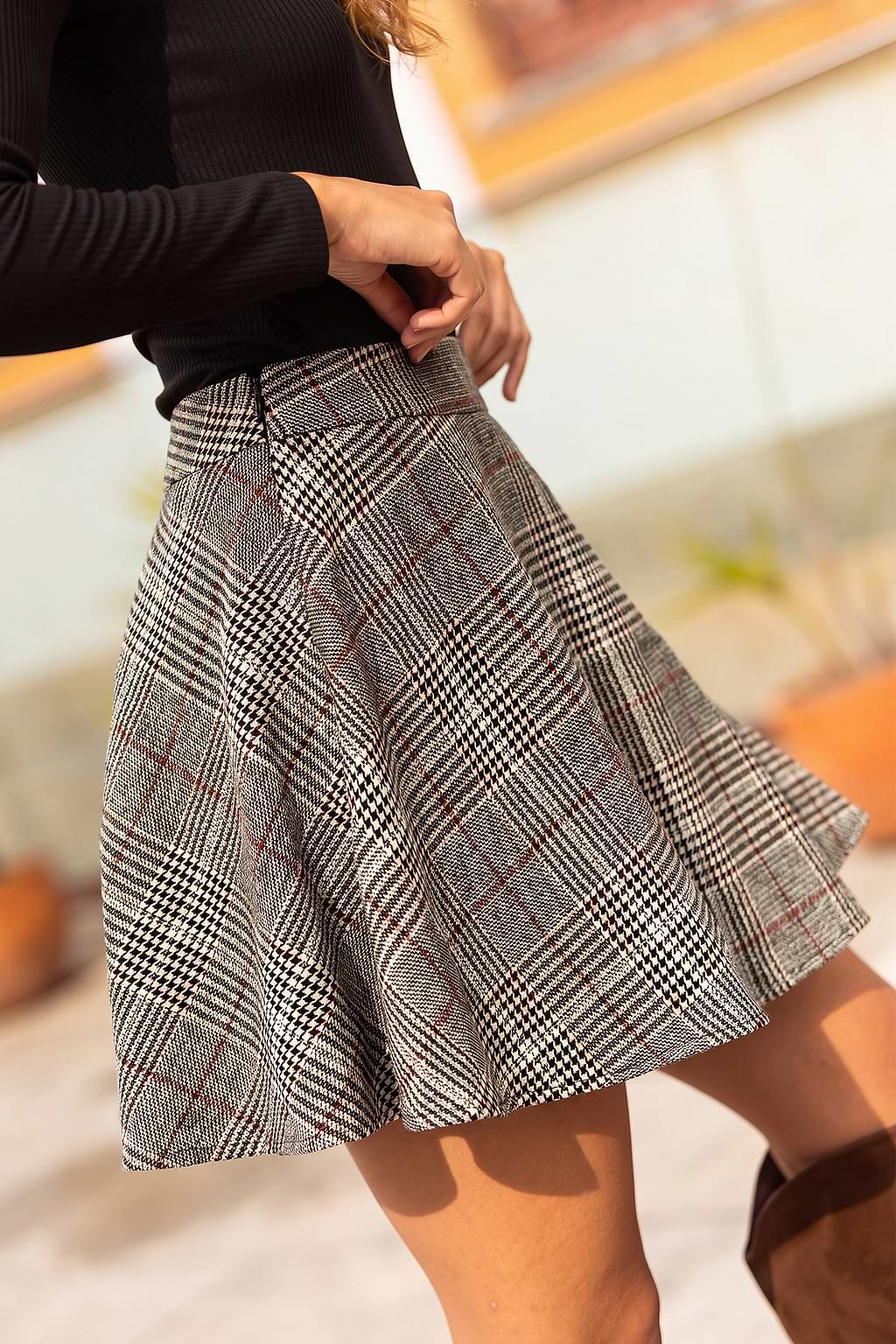 Jupe courte à carreaux et zip latéral