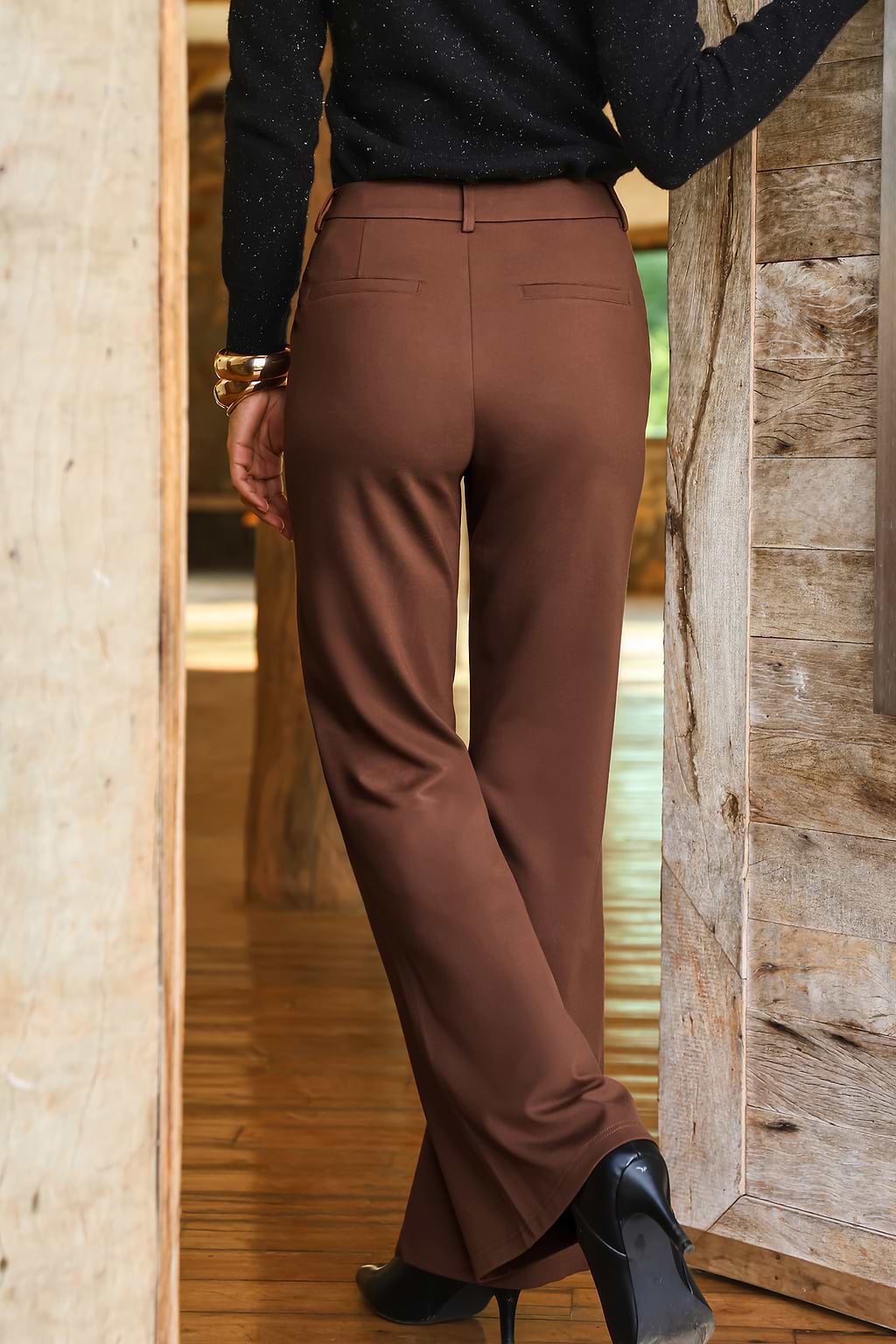 Pantalon orange en tricot à plis nervurés et jambe droite