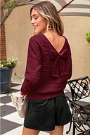 Pull rouge en tricot recyclé à col rond et manches longues